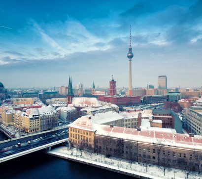 Berlin Skyline Winter City Panorama with snow and blue sky